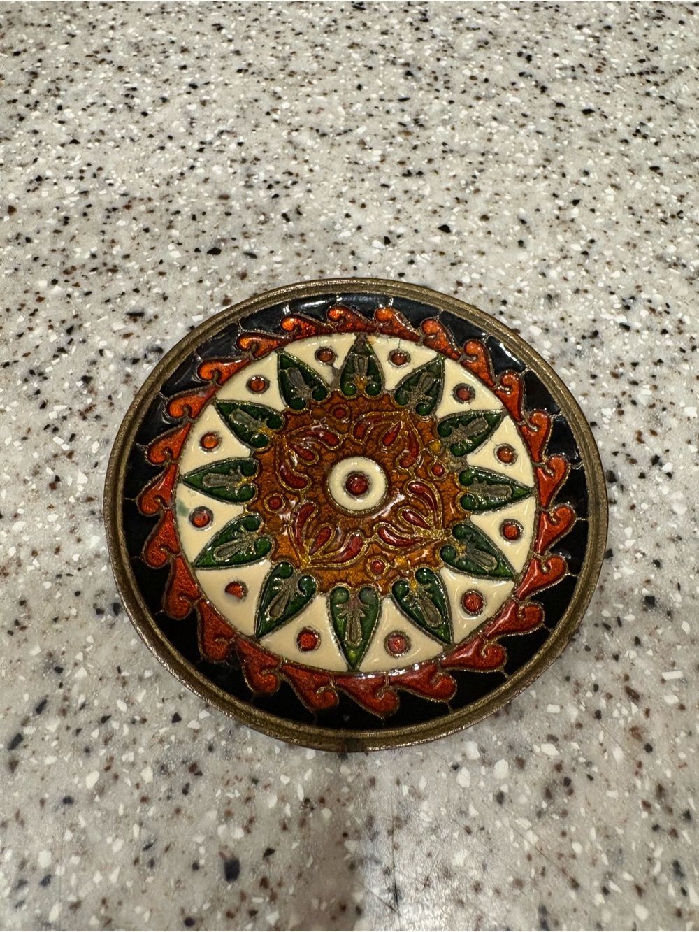Vintage decorative plate features intricate enamel work in a Byzantine mosaic